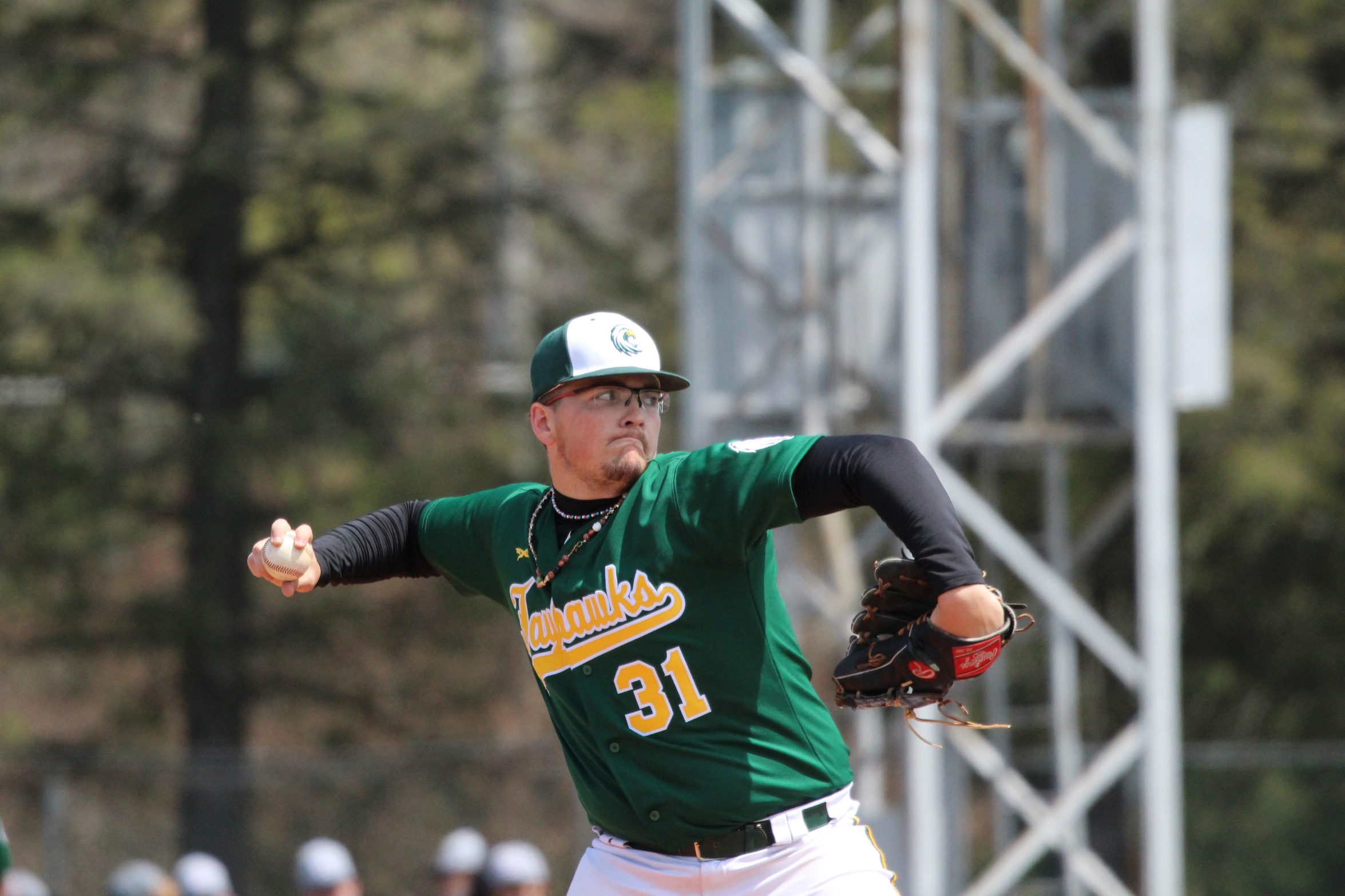 Jayhawks Split On Opening Day